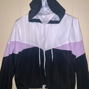 purple, white and black windbreaker